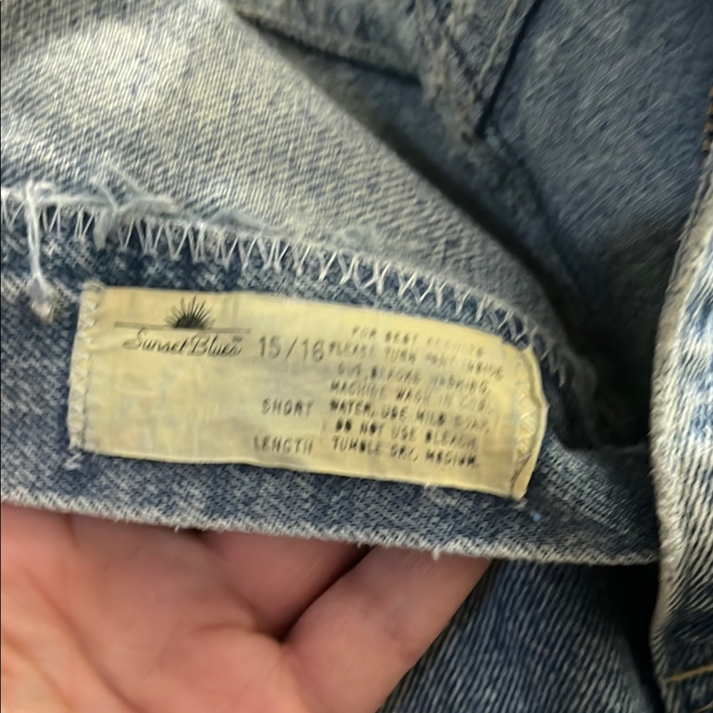 Classic Blue Straight Leg Jeans with Distressed Finish